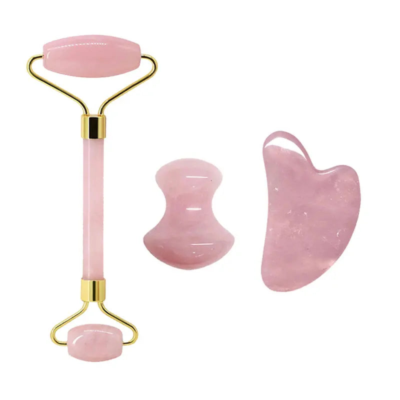 Woman using Lumivo Rose Quartz Roller — rolling upward along cheekbone for lifting